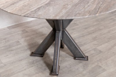 round-travertine-top-table-gunmetal-tank-trap-base